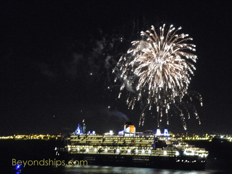 Queen Mary 2 illuminated by fireworks during Cunard's Royal Rendezvous in 